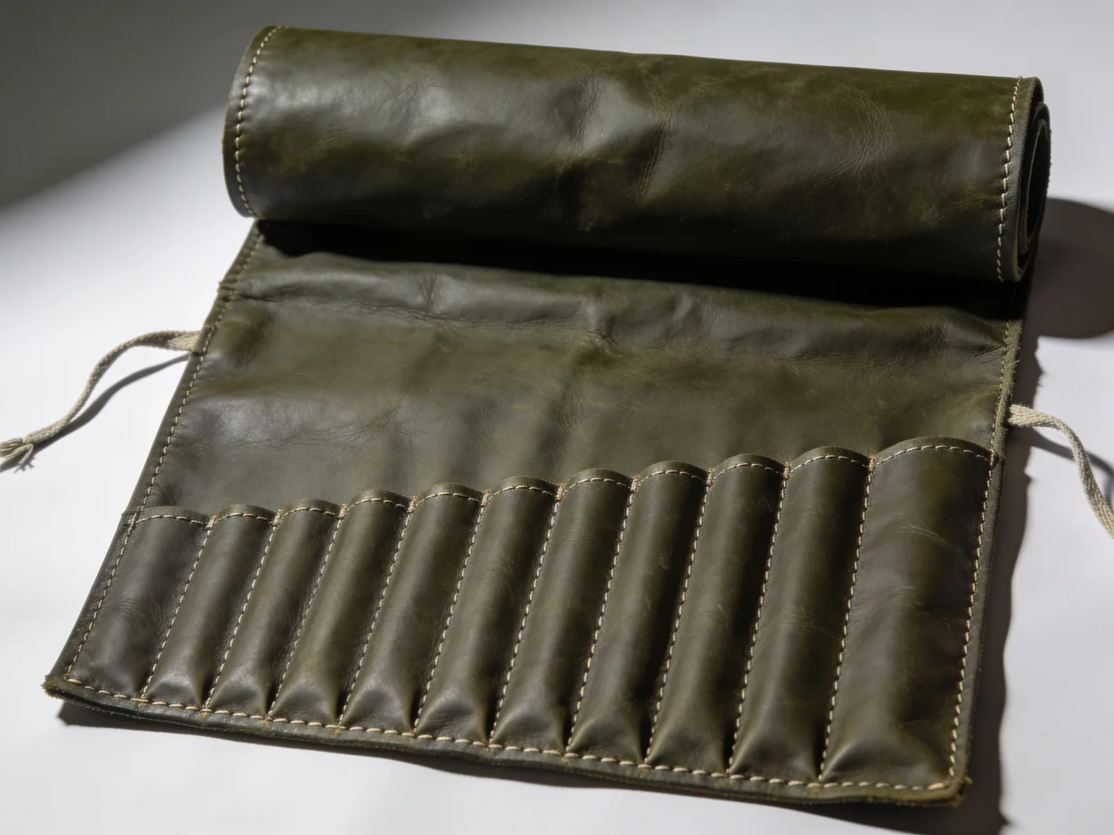 Field Tool Roll — Waxed cotton duck, twelve slots, ties closed