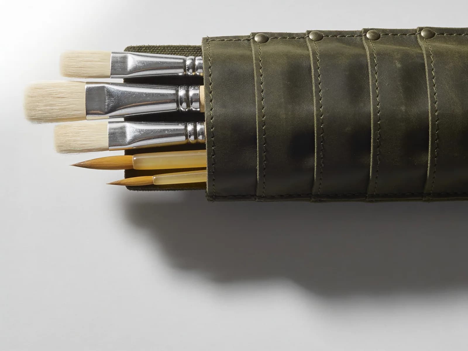 The Brush Roll — Five brushes in the Field roll — the working spread